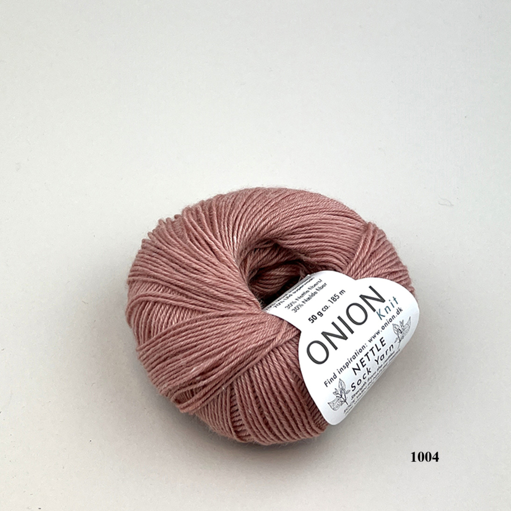 Salmon 1004 Onion Nettle Sock Yarn is available to buy online from UK wool shop, Ida's House.
