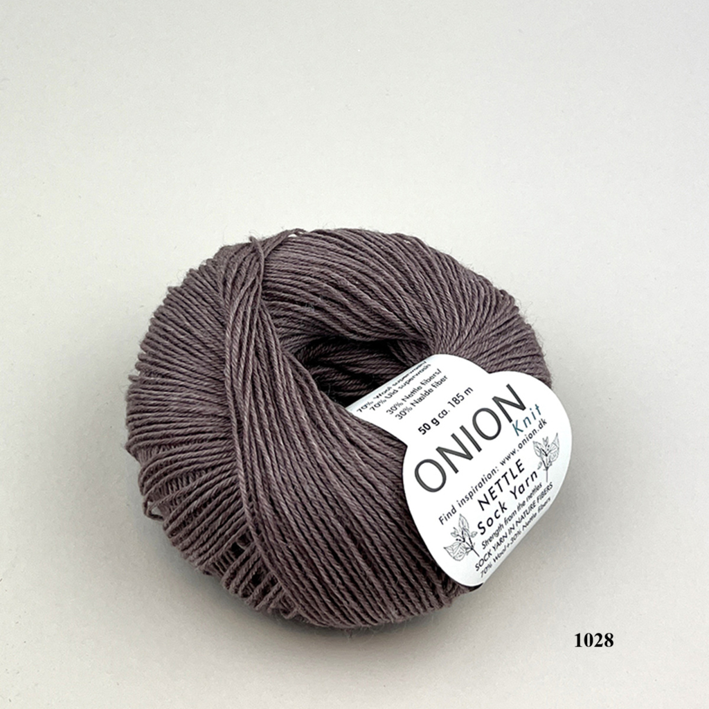  Onion Nettle Sock Yarn shade 1029 is available to buy online from UK wool shop, Ida's House.
