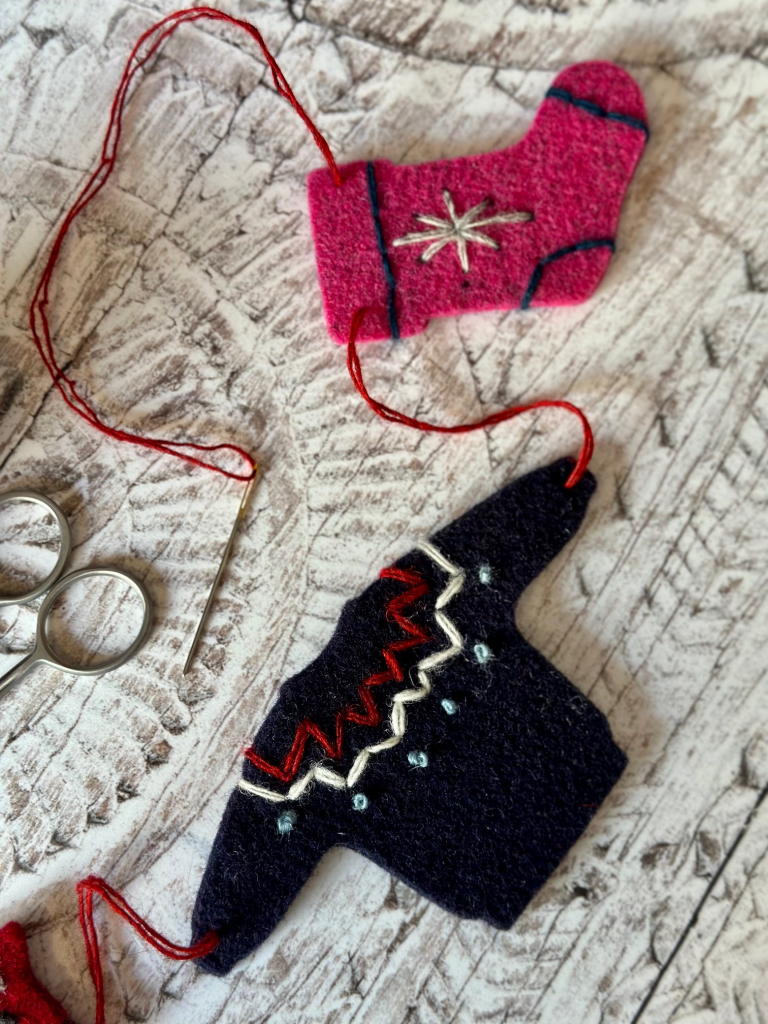 Decorations from the Christmas garland embroidery workshop at UK wool shop, Ida's House. 