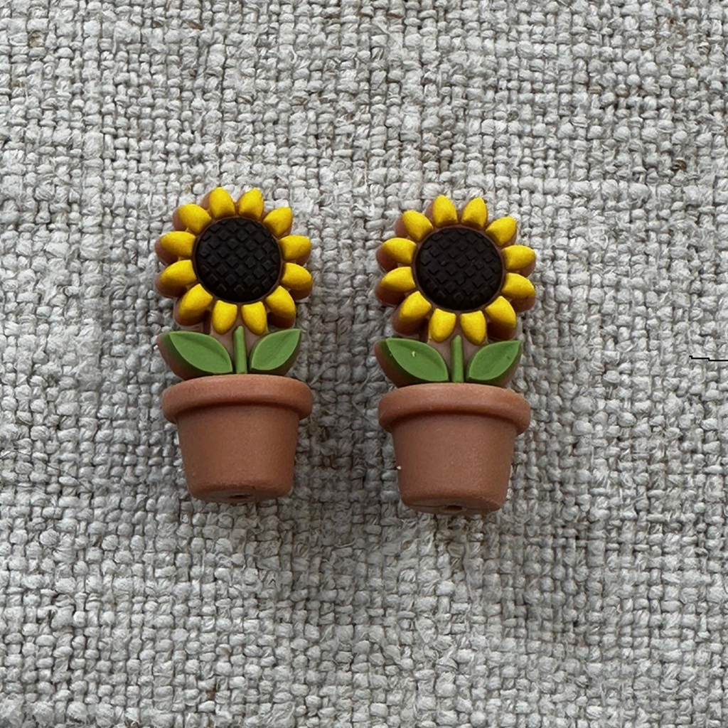 Flower pot point protectors are available to buy online from Ida's House uk yarnshop
