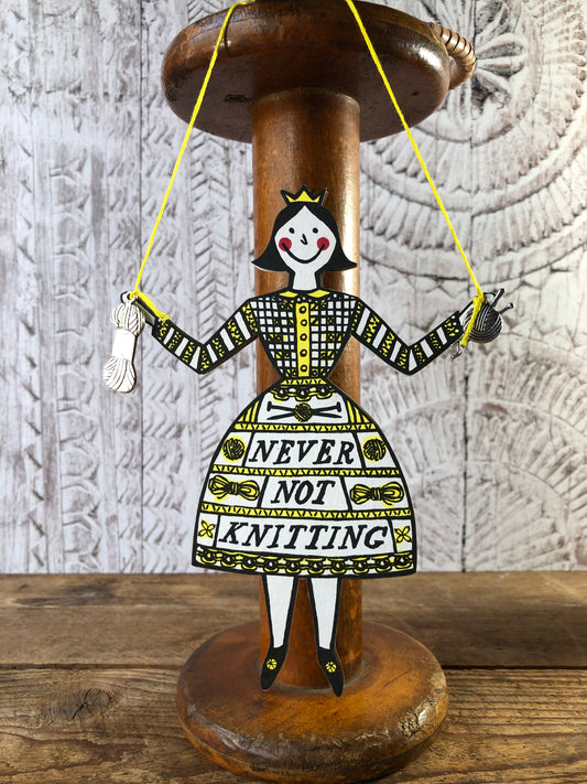 A Never not Knitting Lady Hanging Decoration is available to buy online from UK wool shop, Ida's House.