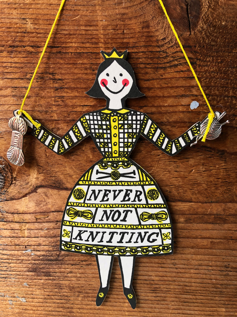 A Never not Knitting Lady Hanging Decoration is available to buy online from UK wool shop, Ida's House.